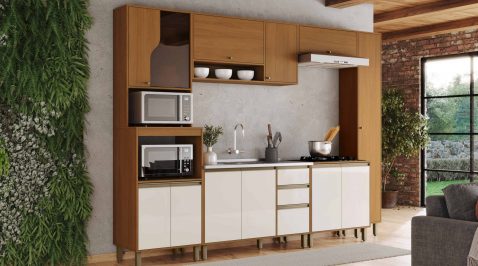 Cozinha com móveis de qualidade em madeira e branco e ambiente integrado à sala.