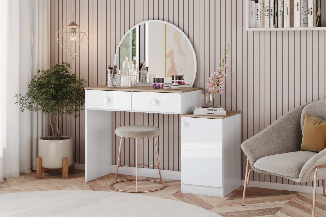 Quarto com decoração em rosa e um dos tipos de penteadeira com espelho oval
